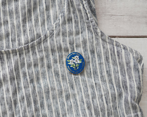 Don't Let the Bastards Get You Down Enamel Pin